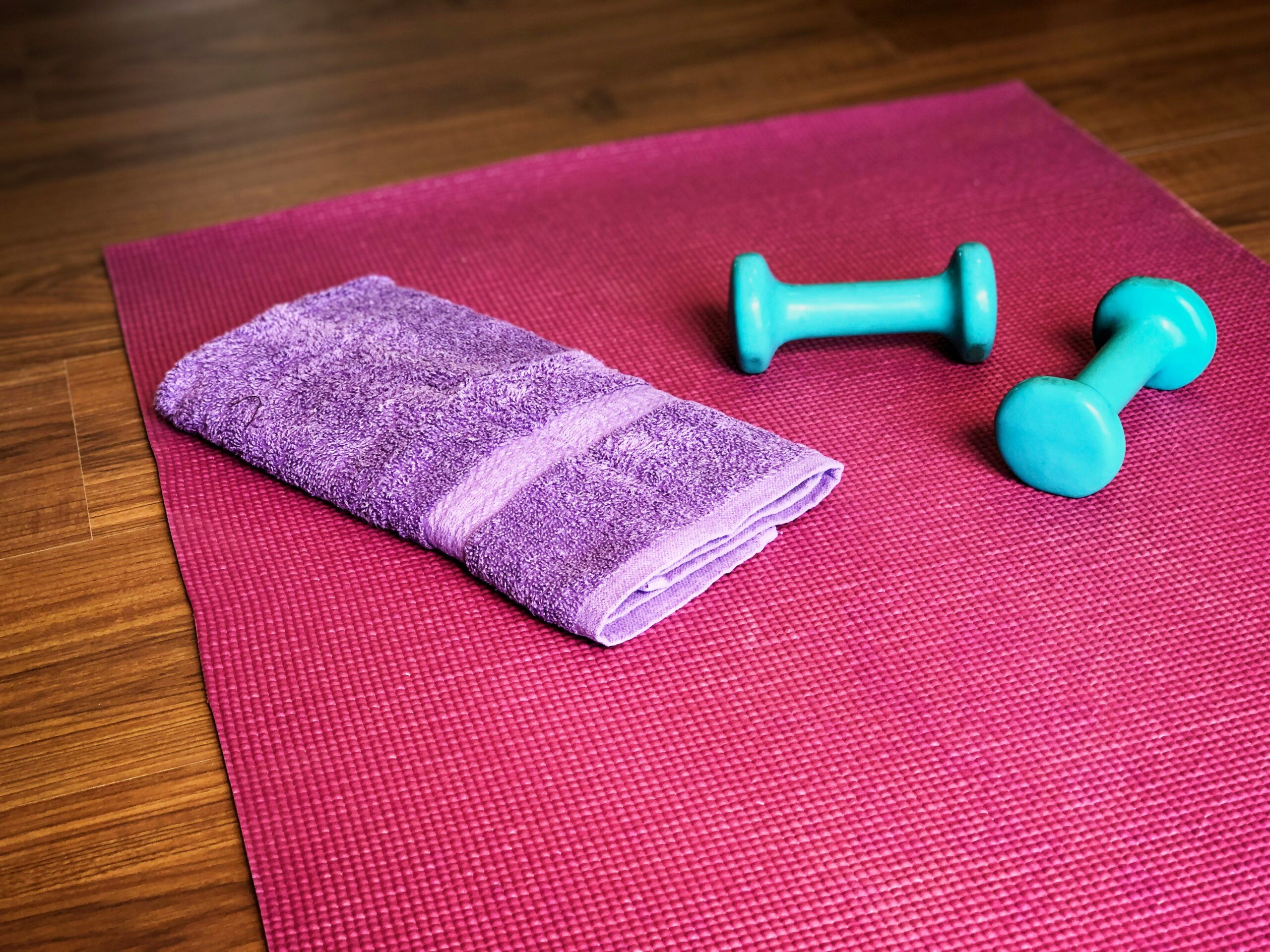 Close-up shot of hands gripping a kettlebell, emphasizing correct positioning