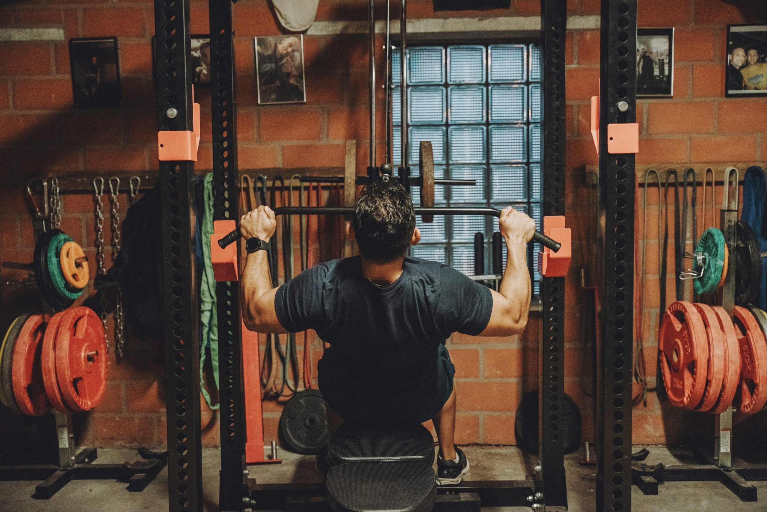 Illustration of three common kettlebell exercises: swing, goblet squat, single-arm press