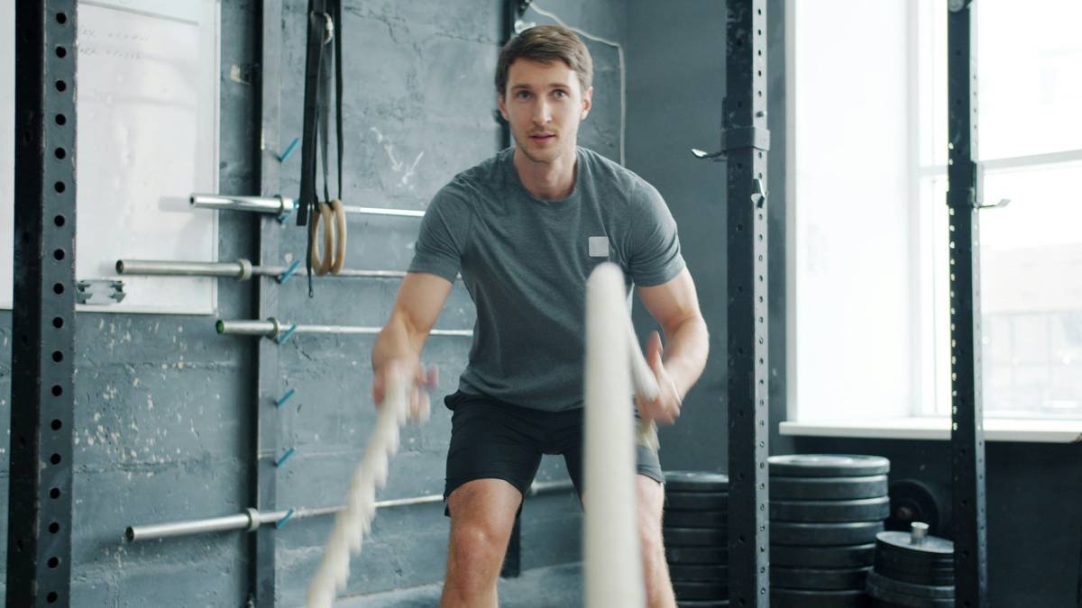 Illustration showing how kettlebells target muscles in arms, legs, core, and back.